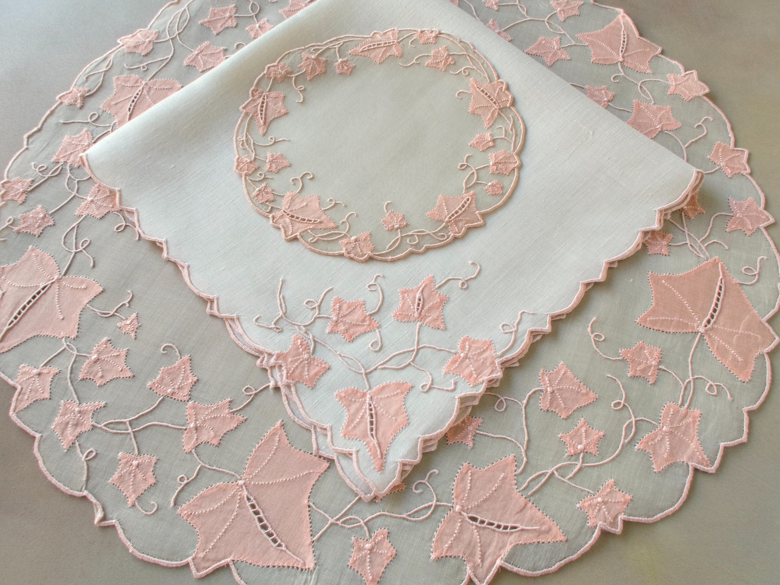 Vintage Marghab “Ivy” placemat set in soft pink organdy with matching linen napkins and coasters, hand embroidered in Madeira with trailing ivy motifs.