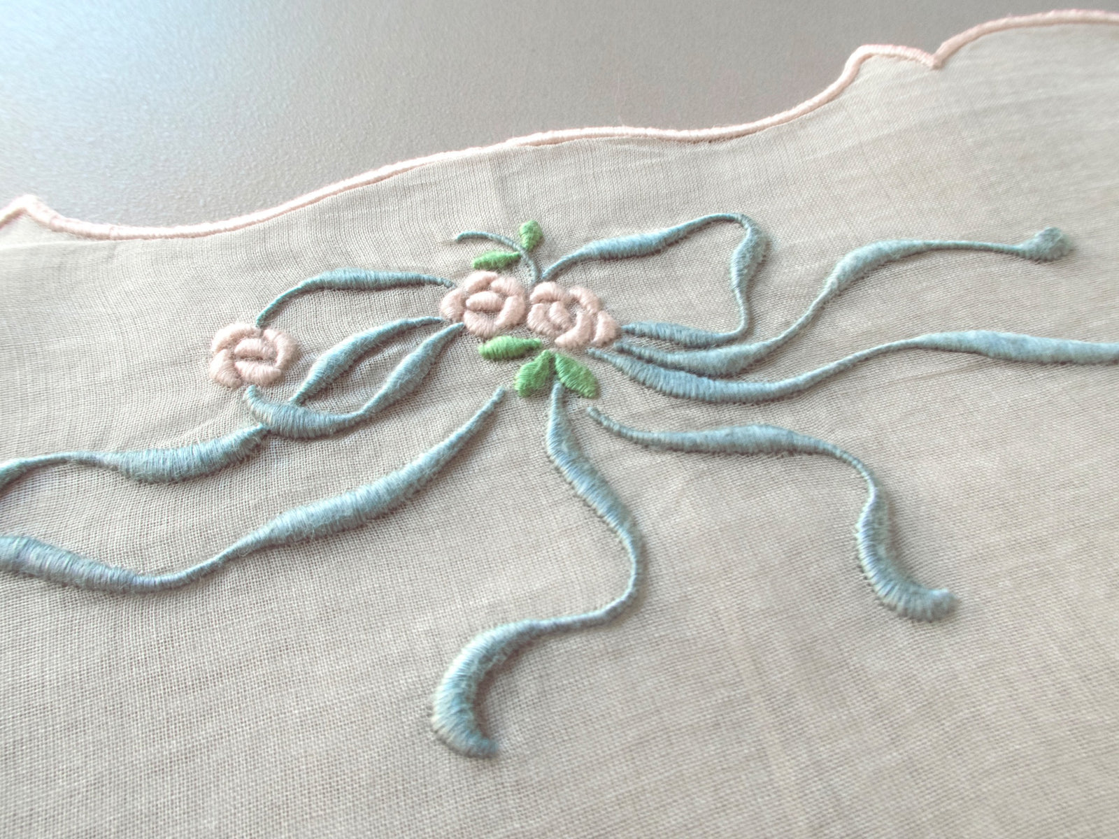 Vintage Marghab “Queen Victoria” pillow cover hand embroidered in Madeira, featuring raised ribbons and roses on fine organdy — elegant, detailed, and in excellent condition.