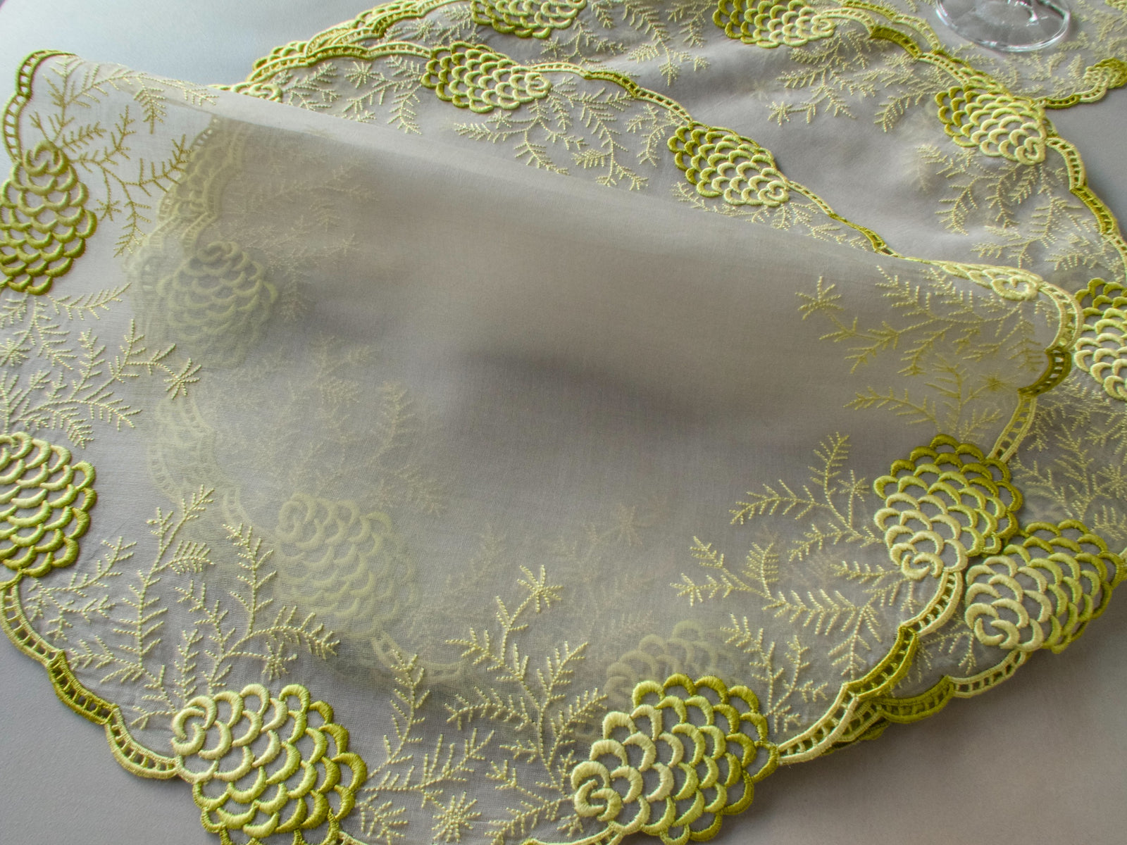 Vintage Marghab organdy placemat showing the sheerness of the fabric