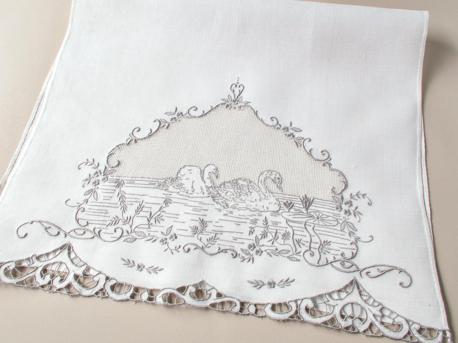 Antique Italian hand embroidered linen guest towel with swan motif.