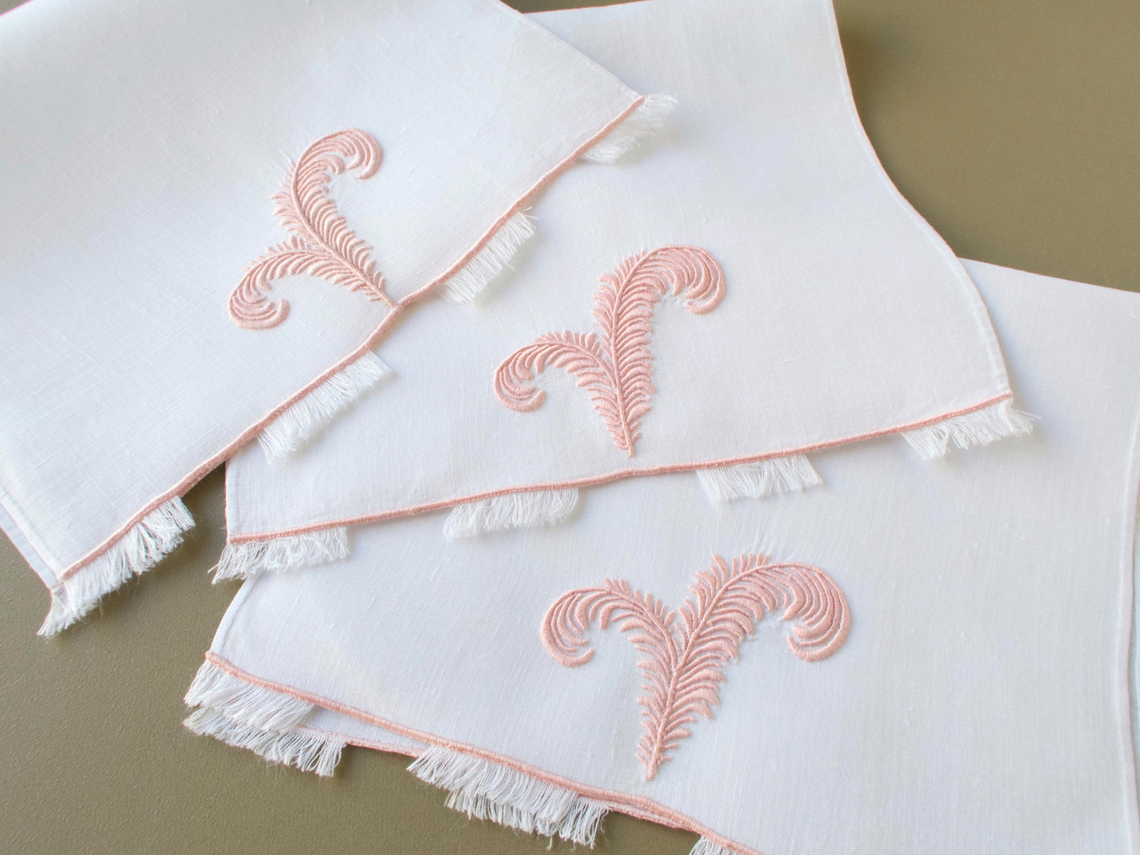 Three vintage Marghab linen fingertip towels with Plume feather embroidery and eyelash fringe edges