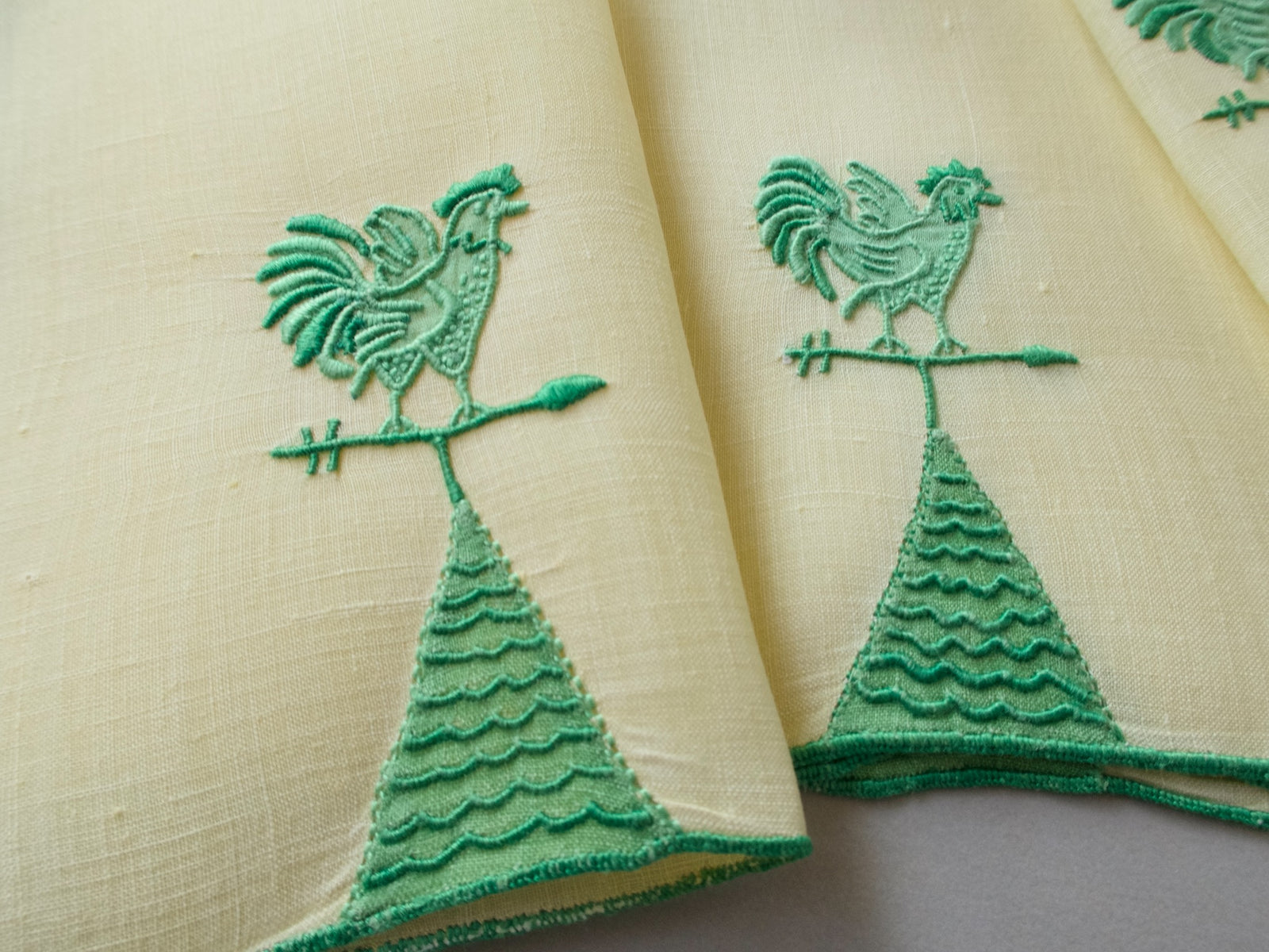 Vintage Marghab Weathervane cocktail napkins, green embroidery on light yellow linen with rooster motif, handmade in Madeira.