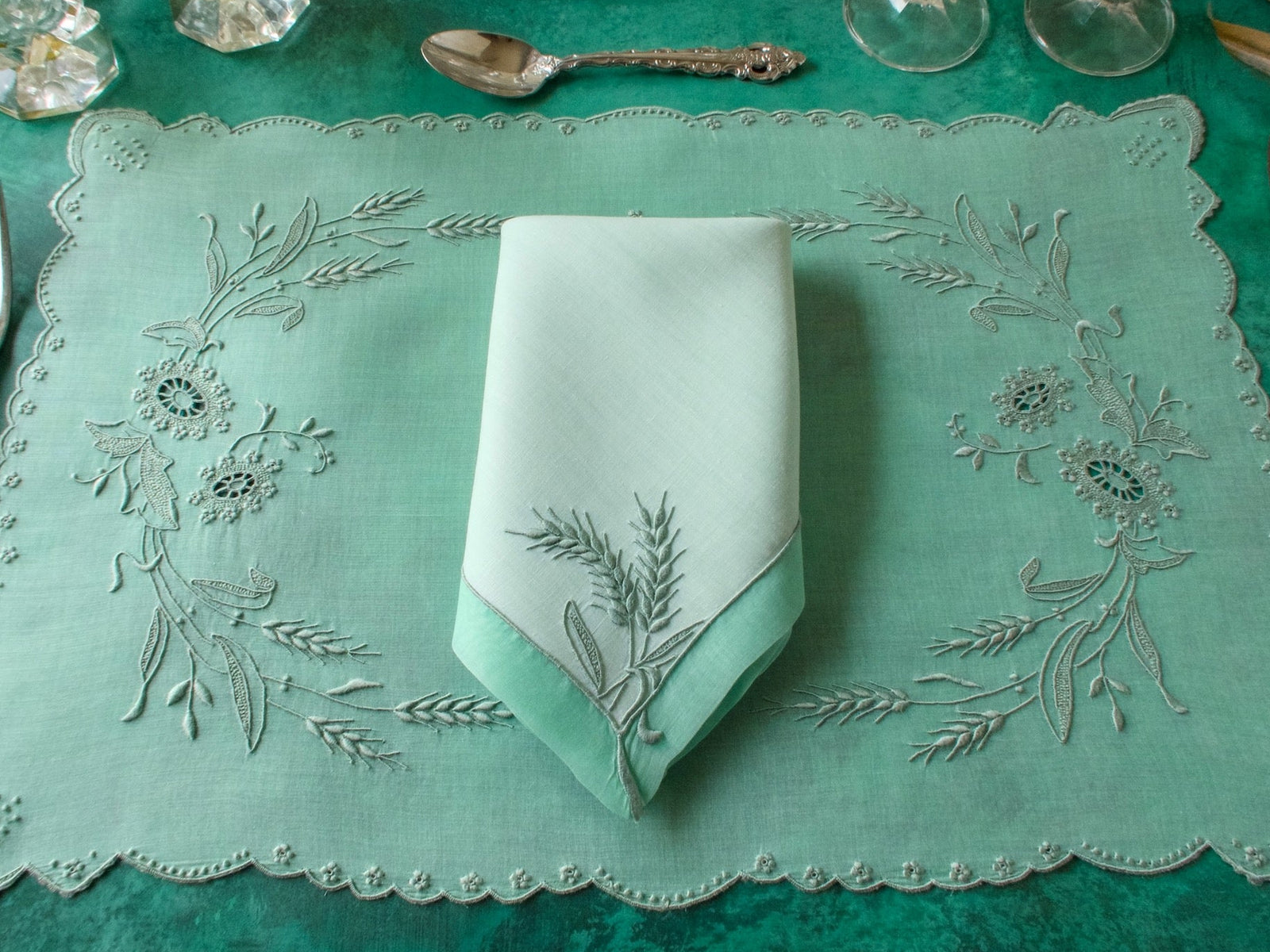 Vintage Marghab Wheat pattern green organdy placemat and napkin set, hand embroidered, styled on table.