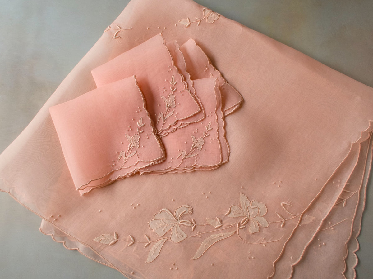 Vintage Marghab “Iris” organdy tablecloth and napkins in coral, hand embroidered with delicate irises on fine sheer organdy.