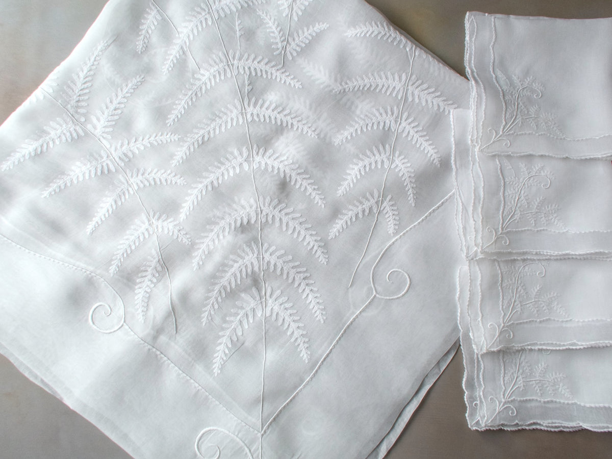 Vintage Marghab “Fern” organdy tablecloth and napkins, hand embroidered in Madeira with delicate appliquéd fern fronds and caseado bastido borders.