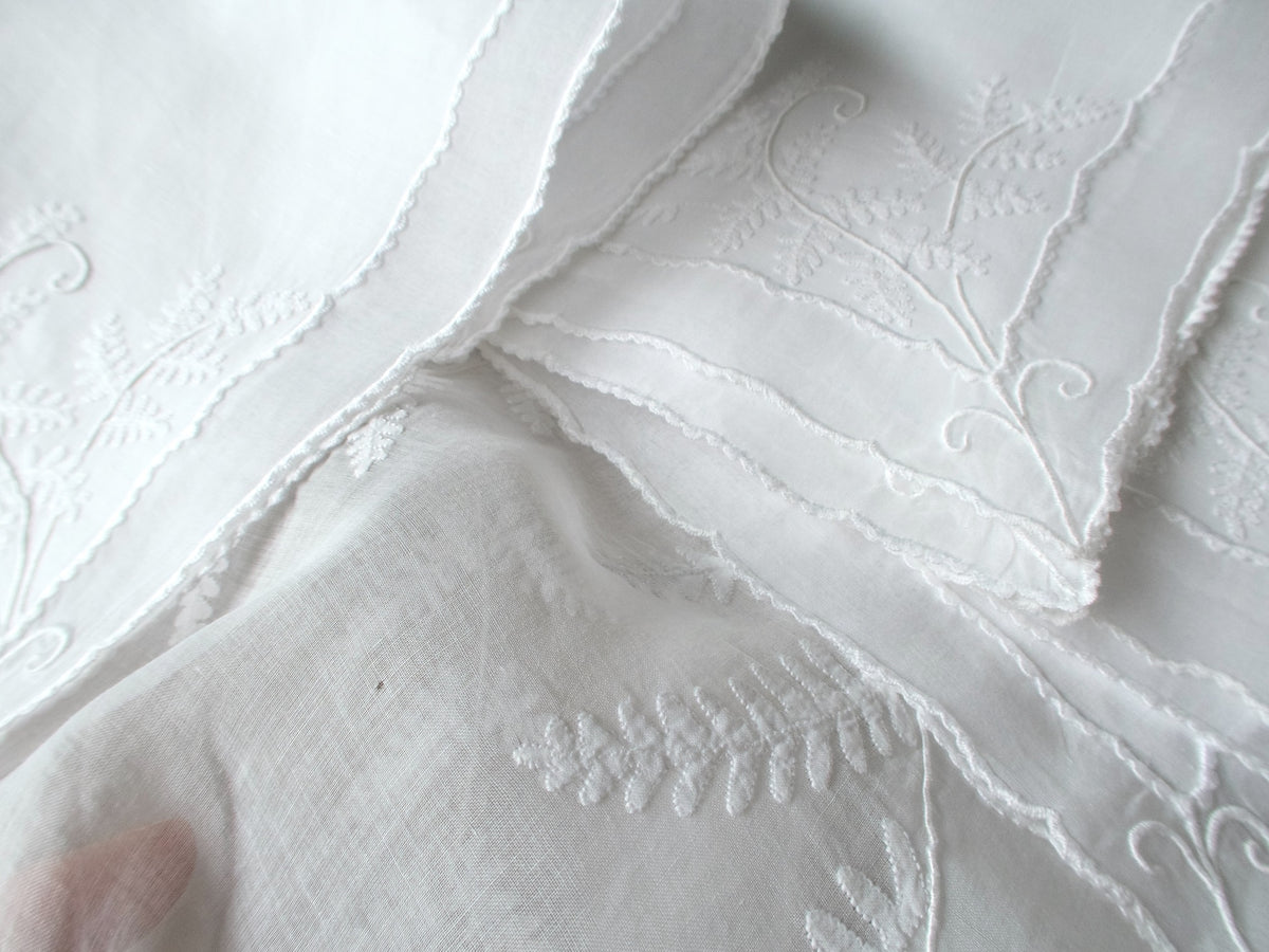 Vintage Marghab “Fern” organdy tablecloth and napkins, hand embroidered in Madeira with delicate appliquéd fern fronds and caseado bastido borders.