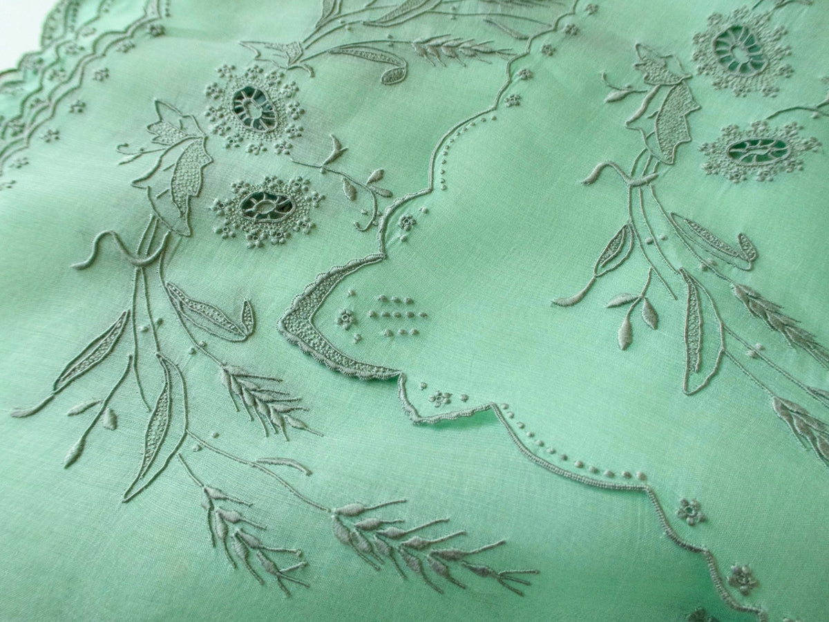 Wheat placemats showing dimensional hand embroidery from Madeira