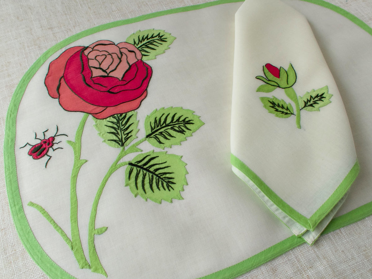 Vintage Italian appliqué placemat set with red rose, white rose, dragonfly and ladybug details on semi-sheer linen with matching napkin​​​​​​​​​​​​​​​​