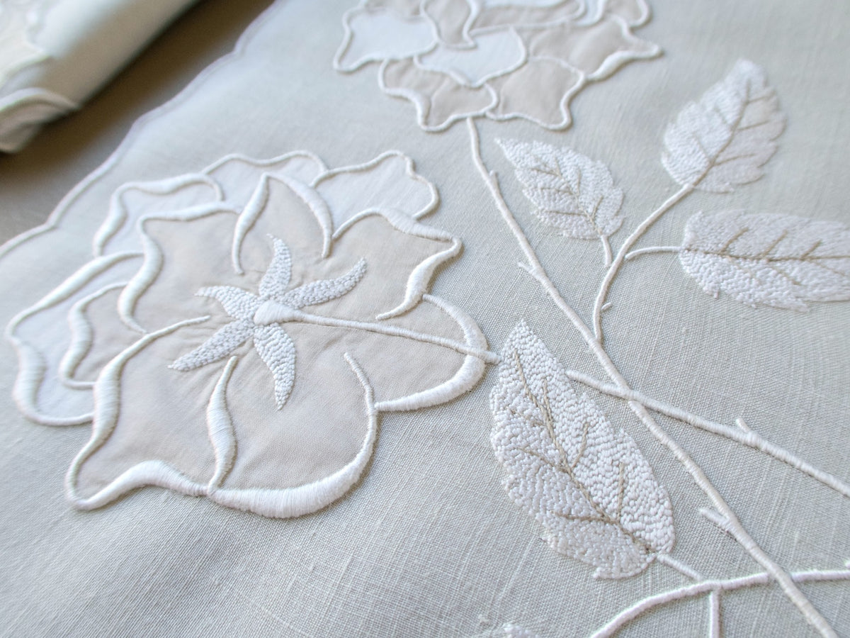 Vintage Marghab "Rose" placemat close-up of an embroidered rose and leaves