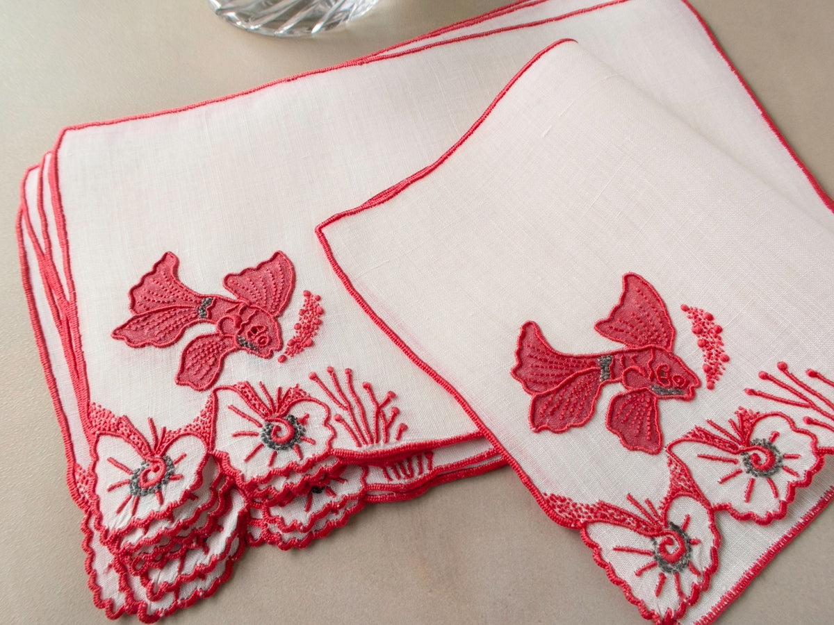 Vintage Marghab Tropical Fish Irish linen cocktail napkins with red appliqué fish, coral, and shells, hand embroidered in Madeira, on beige background