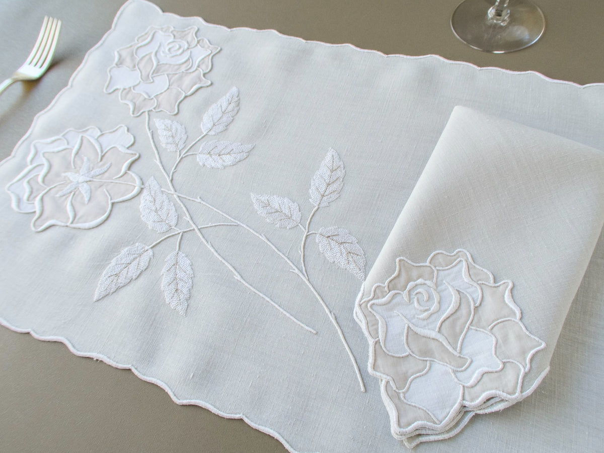 Vintage Marghab "Rose" placemat with napkin folded on top