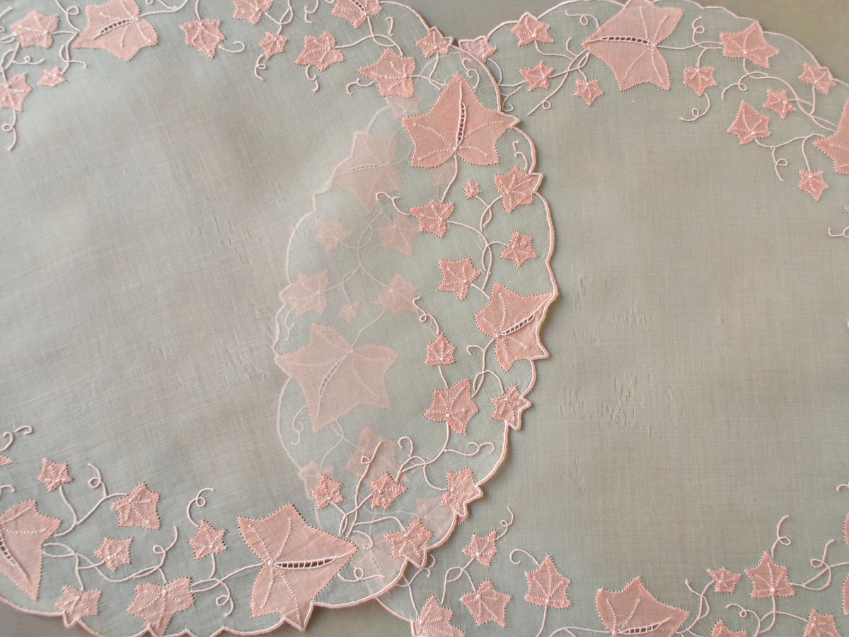 Vintage Marghab “Ivy” placemat set in soft pink organdy with matching linen napkins and coasters, hand embroidered in Madeira with trailing ivy motifs.