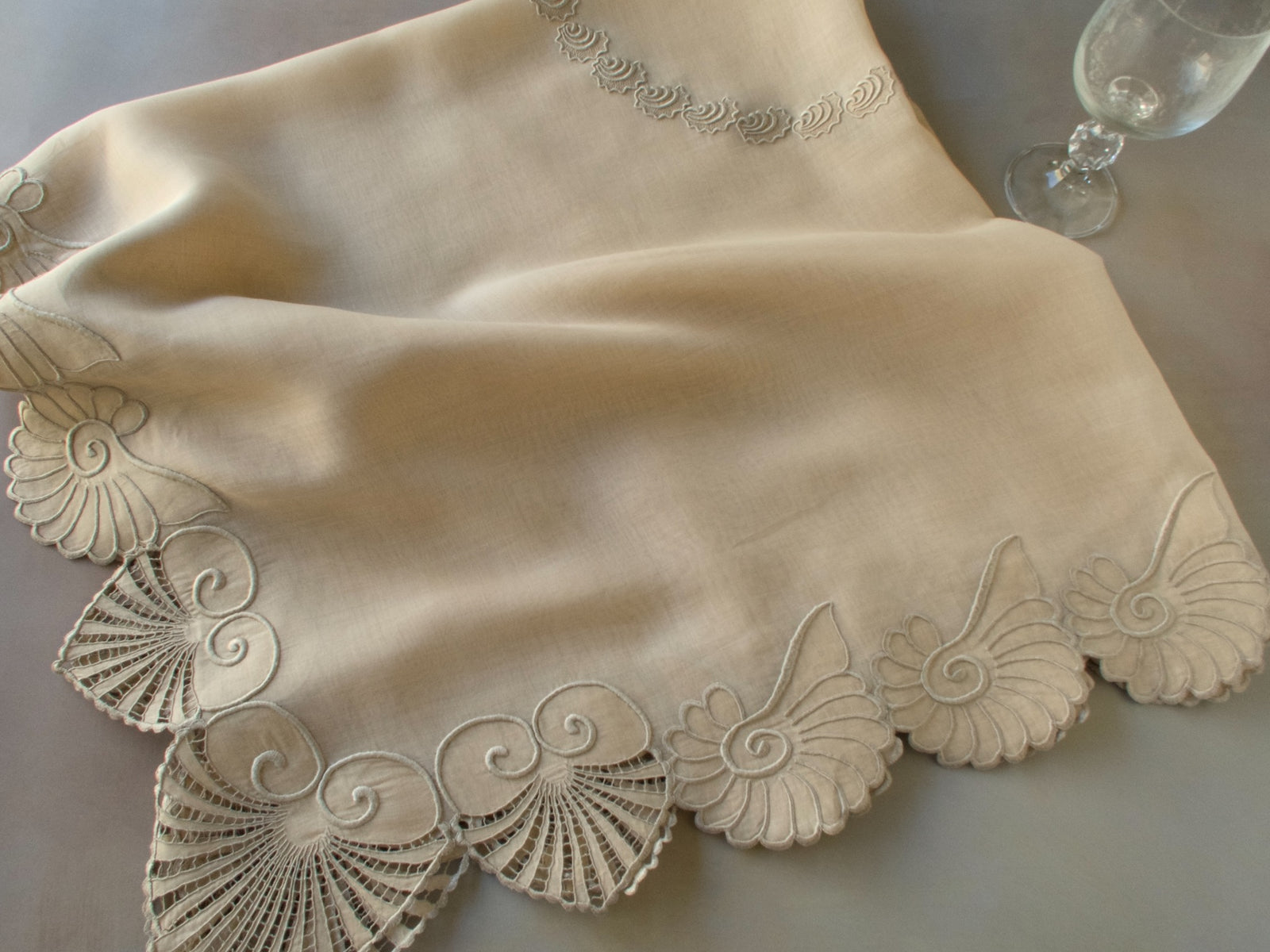 Vintage Marghab “Shell” organdy table topper, hand embroidered in Madeira with a variety of shell motifs and airy cutwork on fine sheer organdy.