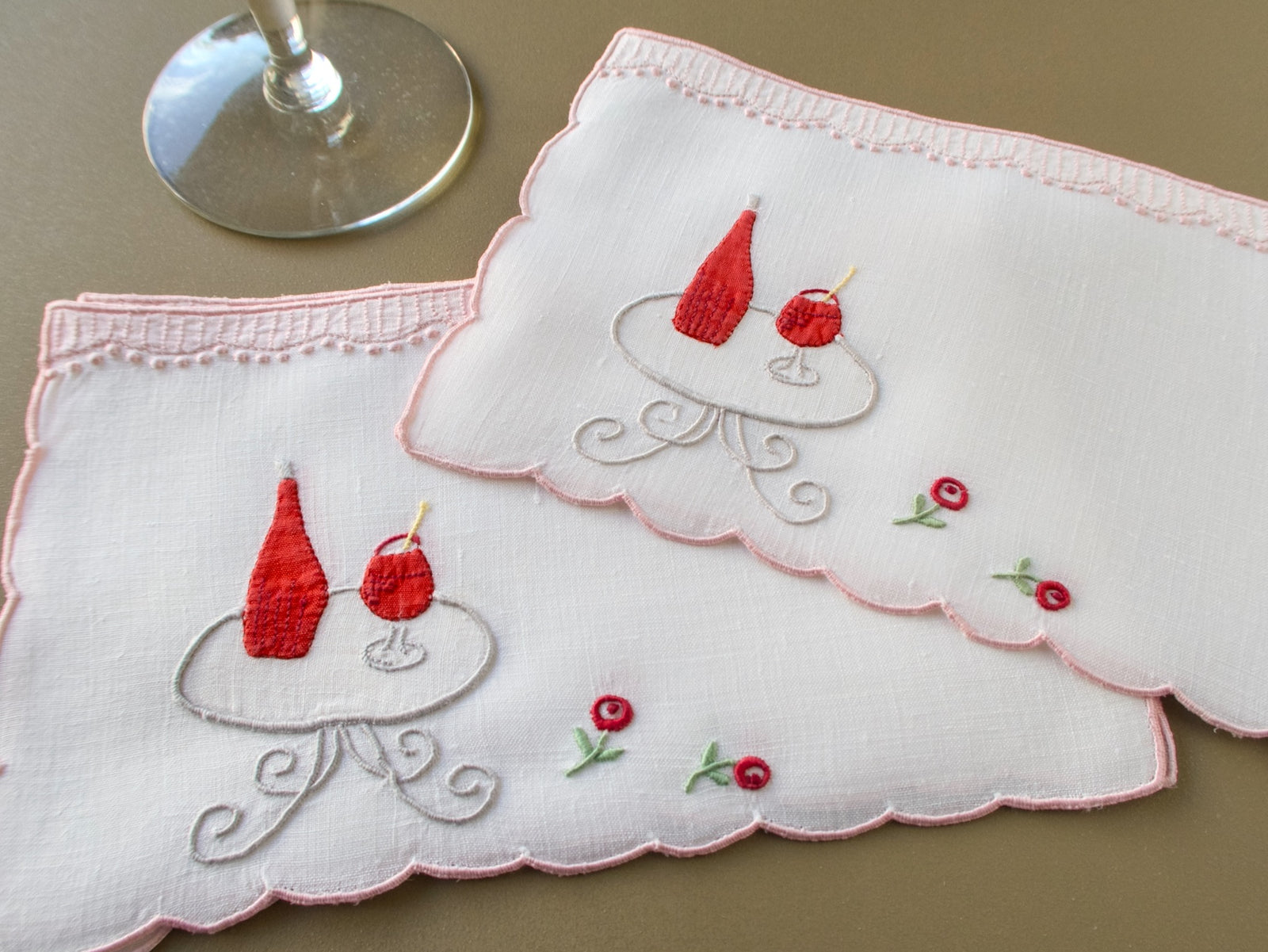 Vintage Madeira cocktail napkins, set of 6, hand embroidered with café table, bottle and glass, roses and pom-pom trim. Excellent condition, gently used.