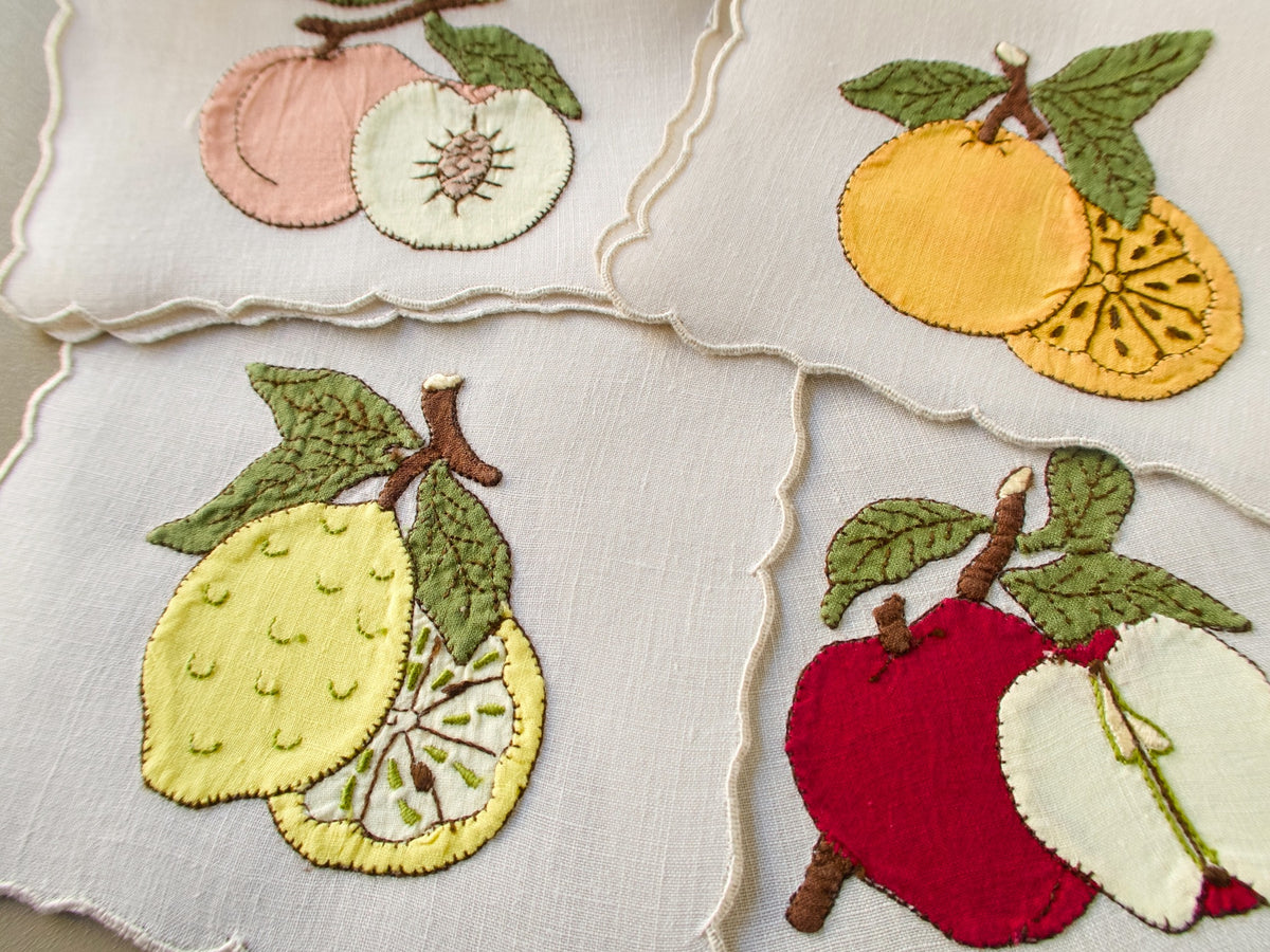 Vintage Madeira cocktail napkins with appliqué apple, lemon, orange and peach shown whole and sliced