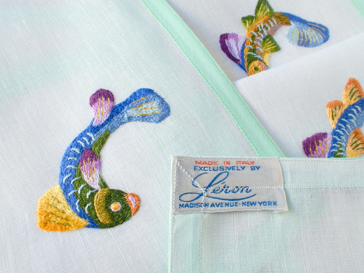 Léron “Made in Italy Exclusively” label on vintage linen cocktail napkin with celadon border — Madison Avenue, New York.​​​​​​​​​​​​​​​​