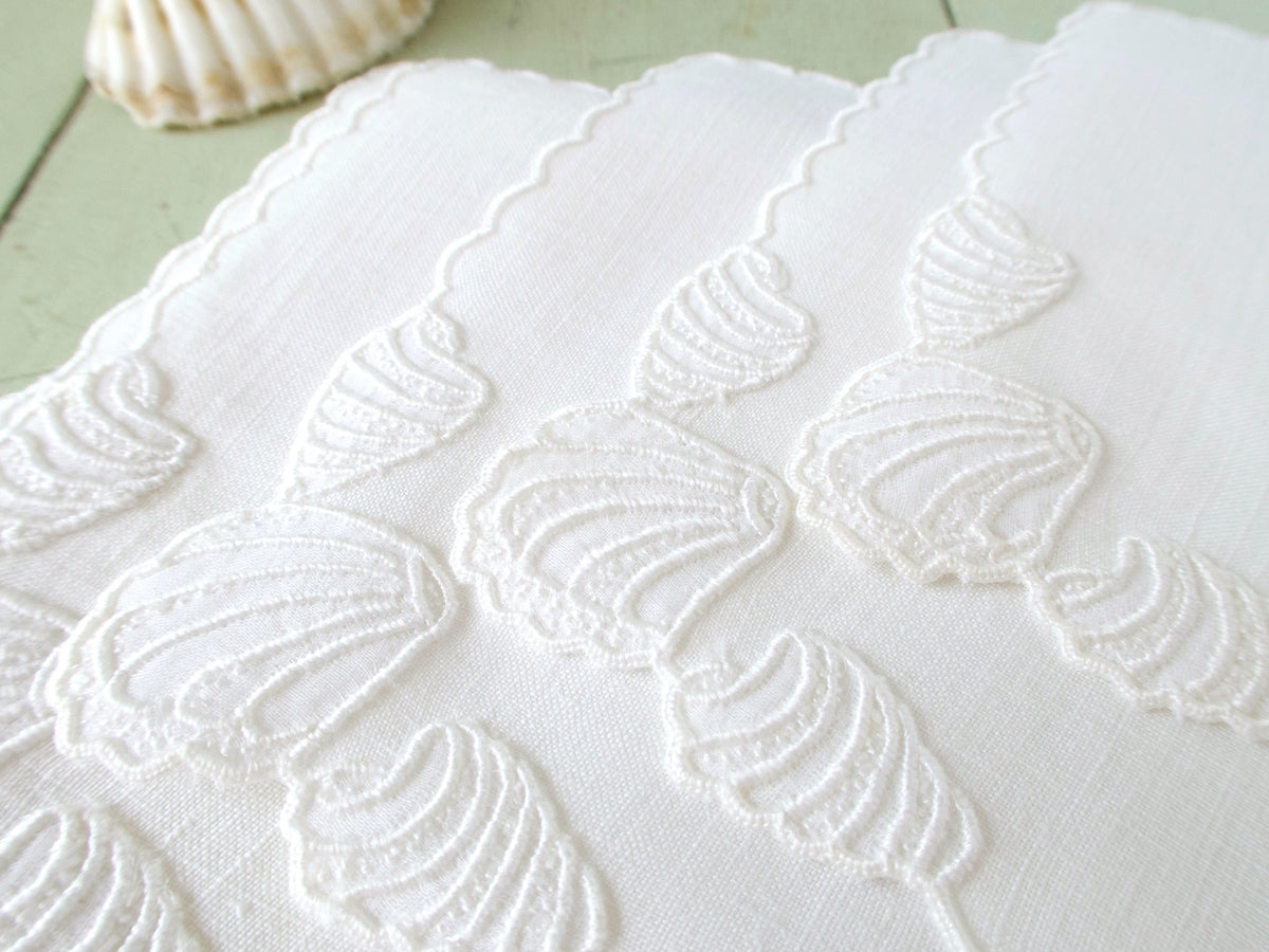 Vintage Madeira cocktail napkins, set of 8, white-on-white raised shell embroidery on fine Irish linen with scalloped edges.