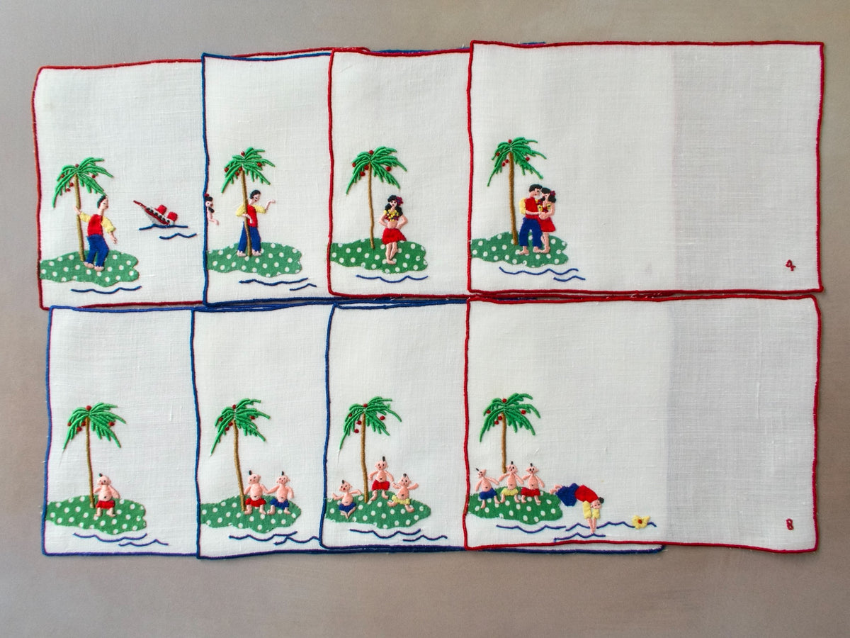 Eight vintage Madeira cocktail napkins showing a tropical island love story embroidered in bright colors.