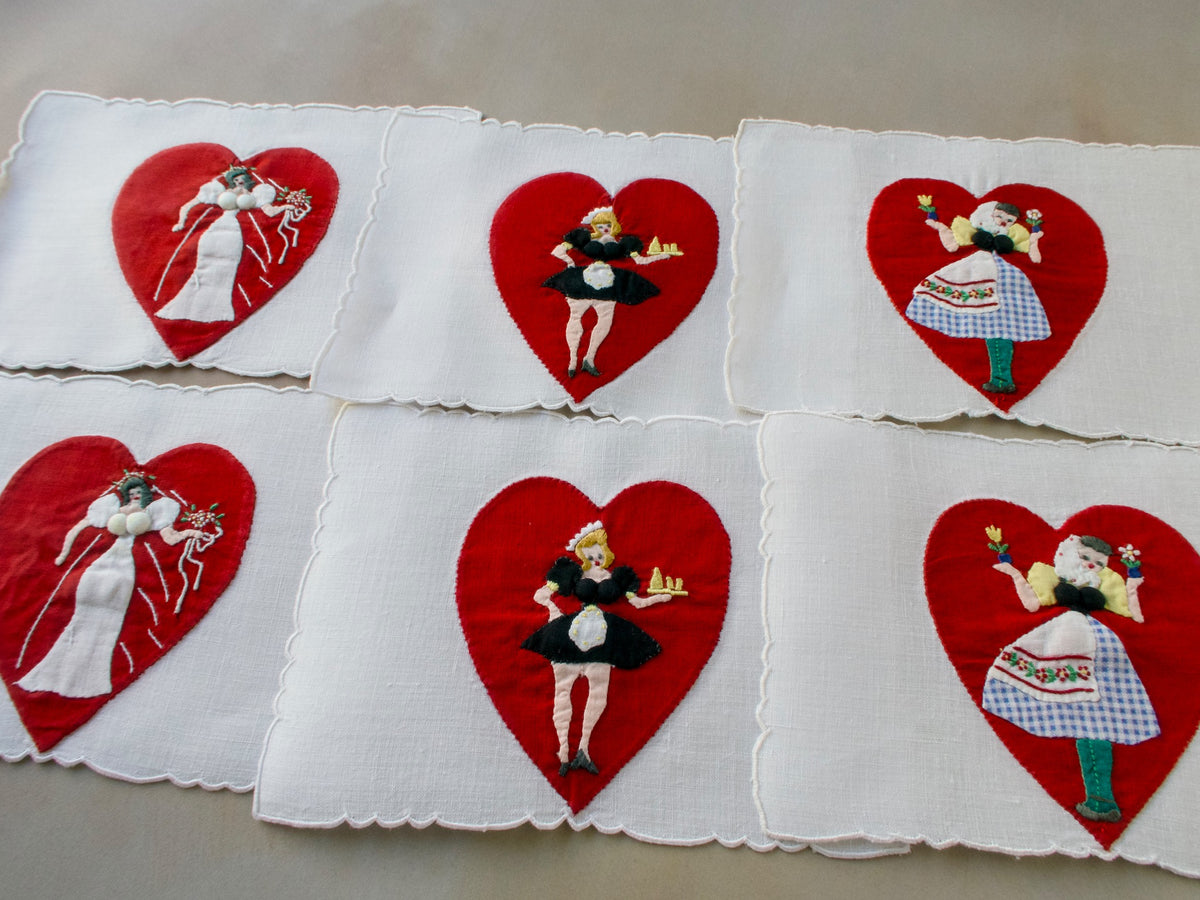 Vintage Madeira cocktail napkins featuring red hearts with pretty ladies on white linen