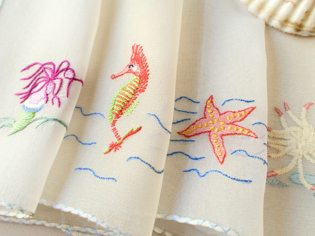 Vintage French silk chiffon cocktail napkins, set of 4, hand embroidered seahorses, starfish and sea creatures in delicate color on semi-sheer ground.