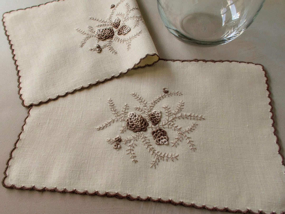 Full shot Marghab&#39;s &quot;Pines Cones&quot; pattern, embroidery on linen cocktail napkin, Madeira handwork.
