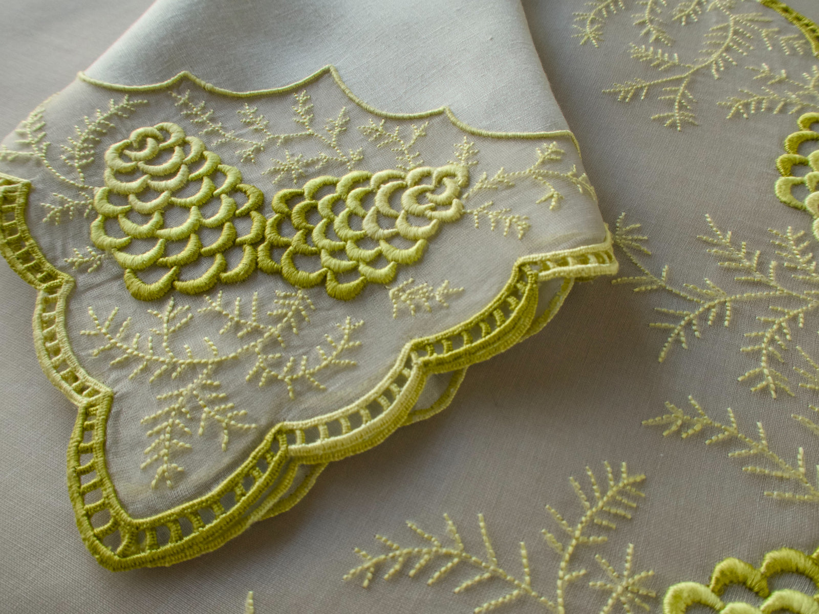 Vintage Marghab napkin corner with scalloped edge and raised pine cone embroidery