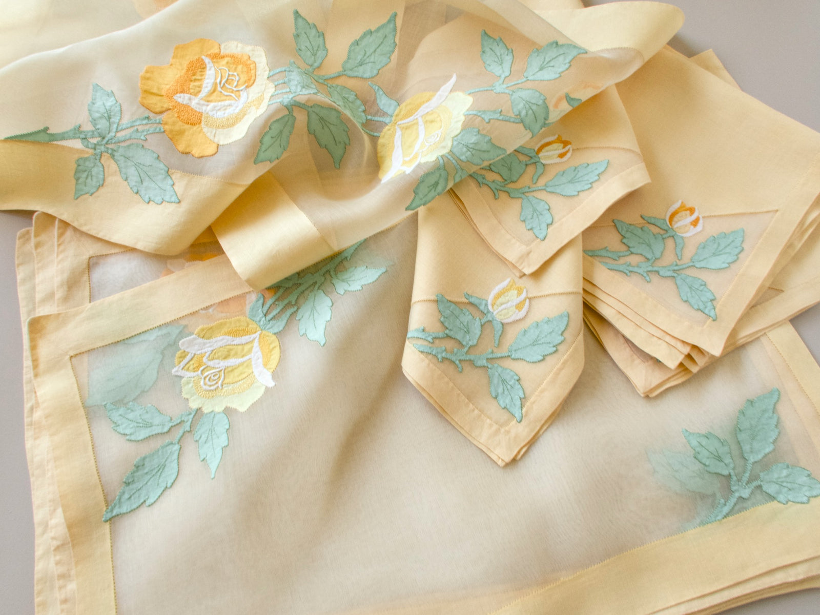 Full vintage Madeira yellow rose placemat set for 6, organdy placemats and runner with linen napkins grouped together​​​​​​​​​​​​​​​​