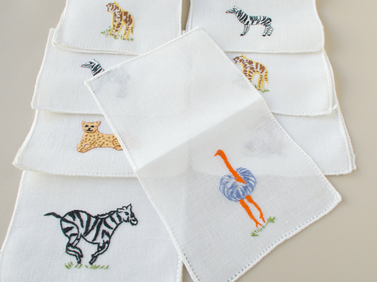 Vintage Italian cocktail napkins showing ostrich, zebra and leopard  embroidery details​​​​​​​​​​​​​​​​