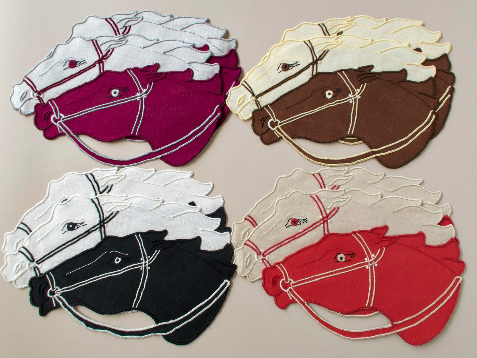 Four pairs of vintage Madeira hand embroidered cocktail napkins showing all color combinations: burgundy/white, brown/cream, black/white, red/cream