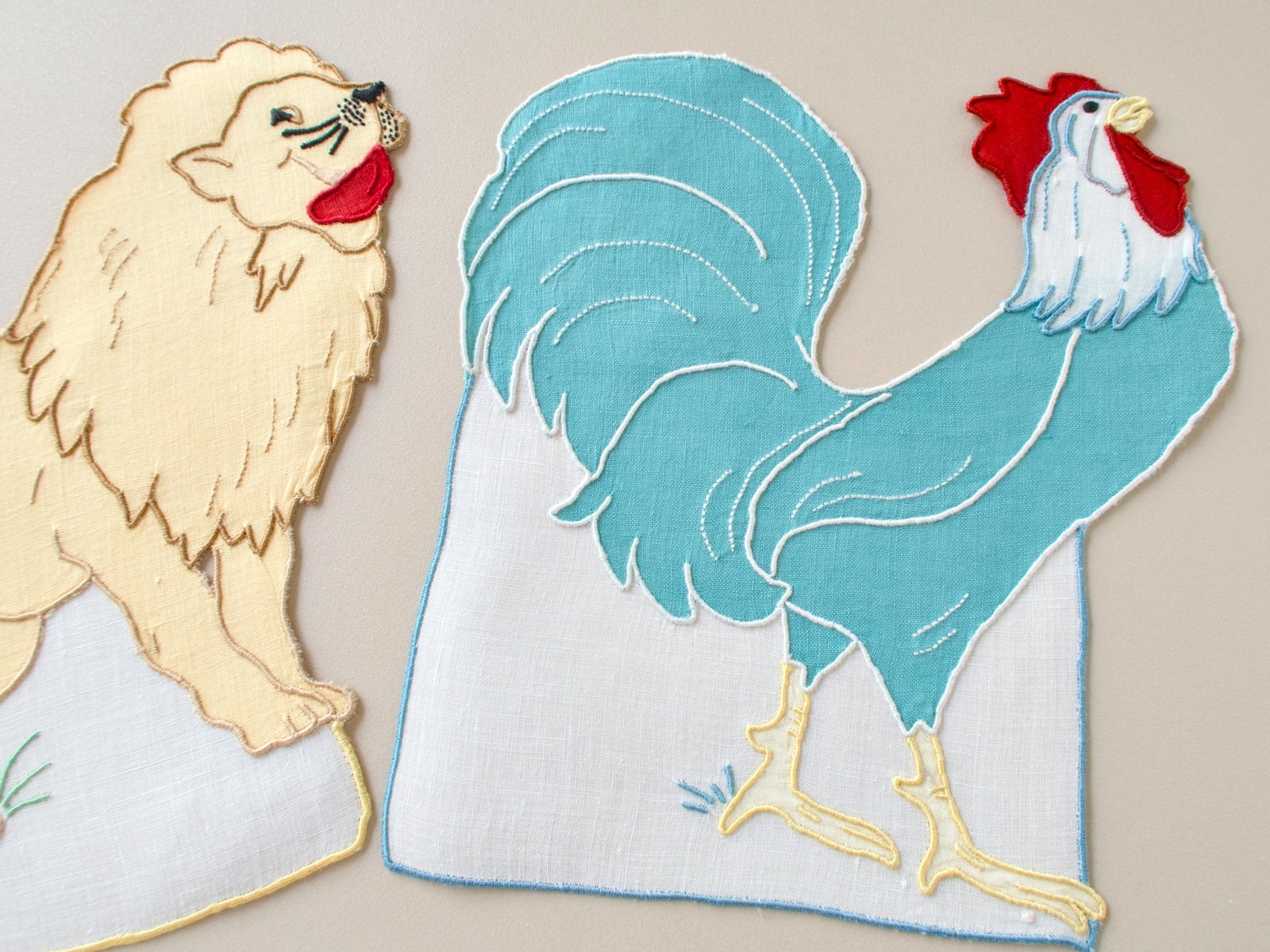 Vintage Madeira hand embroidered cocktail napkins, golden lion and teal rooster silhouettes, fine linen