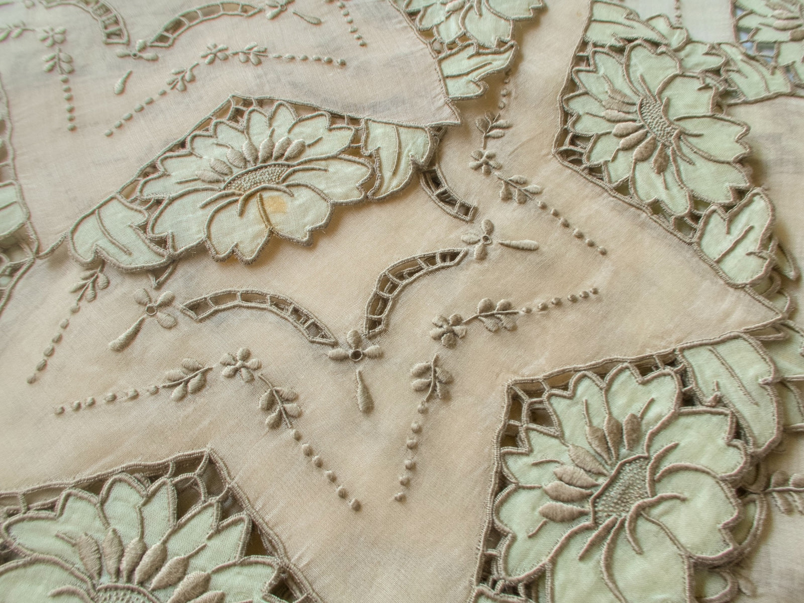 Vintage Madeira organdy placemat showing small storage mark, condition disclosure photo