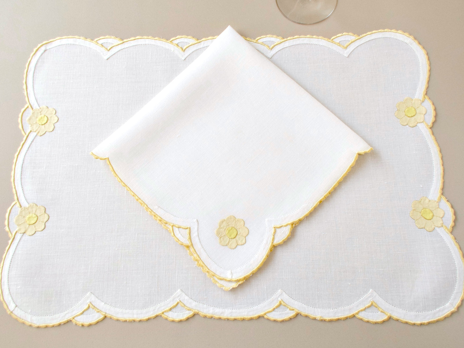  Vintage Madeira placemat and napkin  showing daisy appliqué detail and caseado bastido scalloped border on creamy Irish linen
