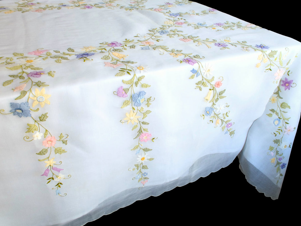 Vintage hand-embroidered organdy tablecloth with pastel floral garlands