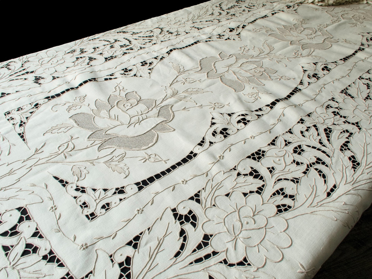 Raised embroidery and floral cutwork detail of vintage Madeira tablecloth