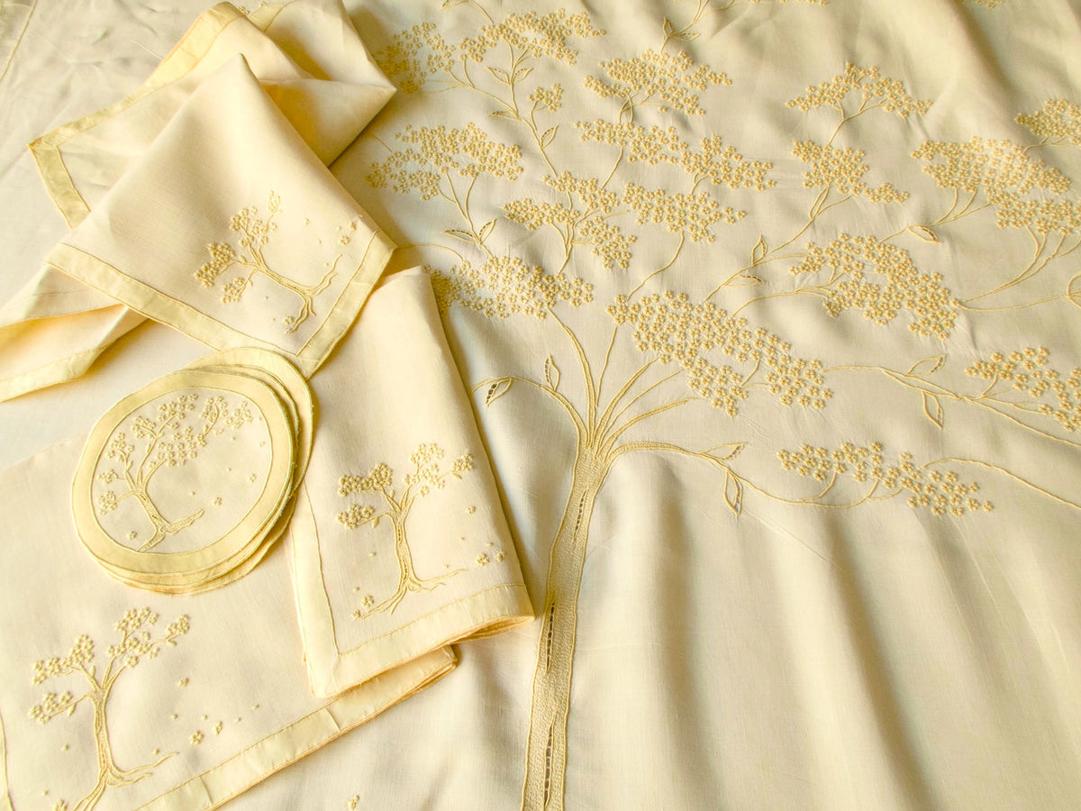 Set of vintage Marghab napkins and coasters with Jacaranda Tree embroidery on yellow linen