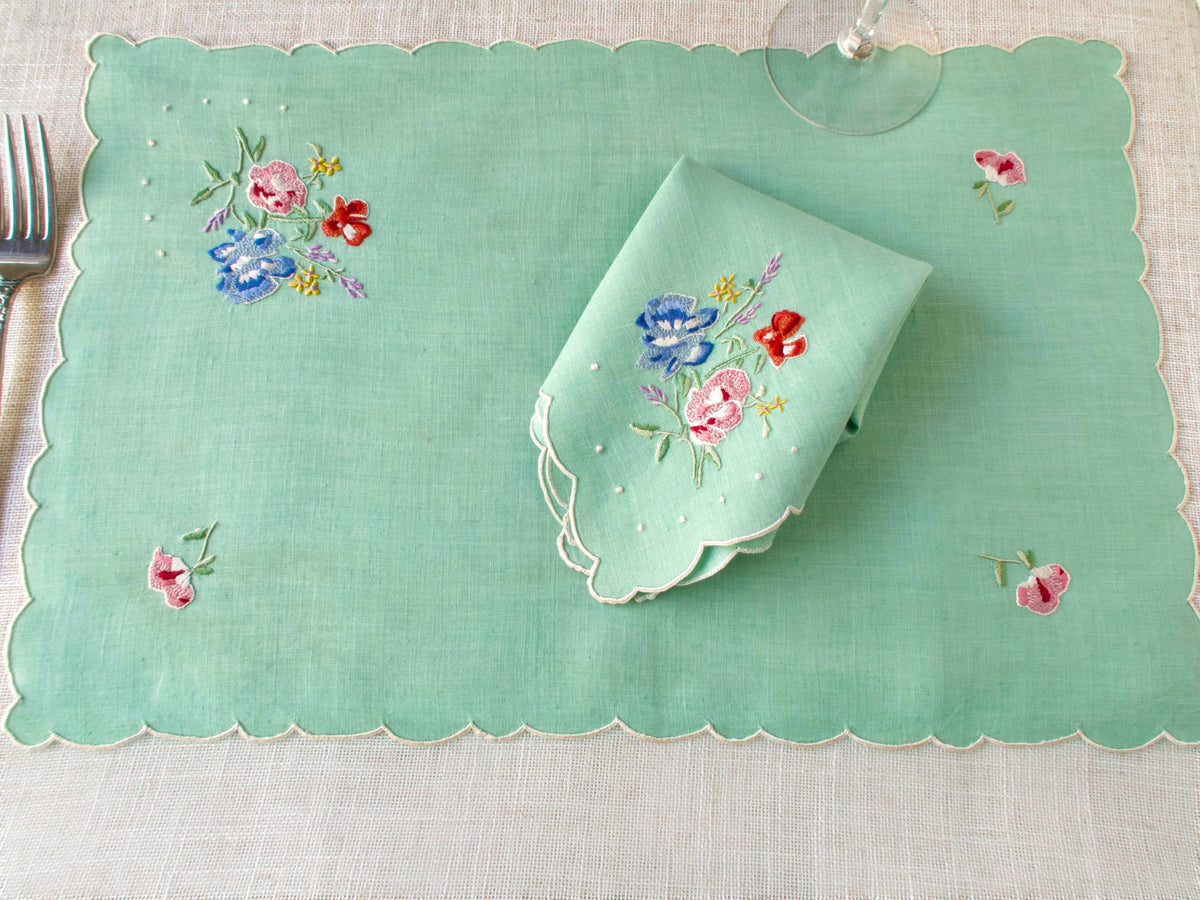 Vintage Madeira green linen placemat and napkin with hand embroidered floral bouquet