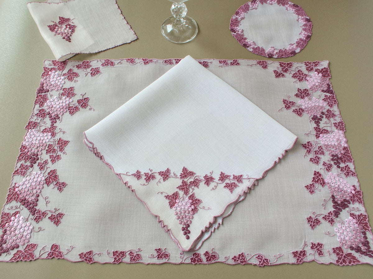 Vintage Marghab Vineyard place setting with placemat, napkin, coaster, cocktail napkin and crystal glass