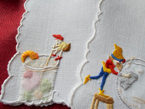 Elves help at the bar, embroidered vintage cocktail napkins.
