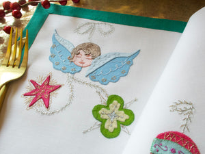 Vintage placemat set with embroidered Christmas angel