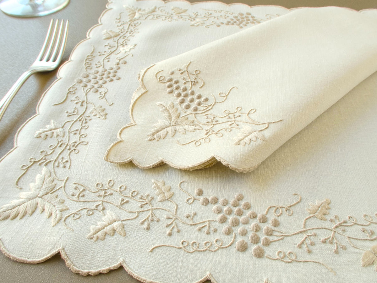 Vintage Madeira linen placemat hand embroidered with trailing grapevines and scalloped edges