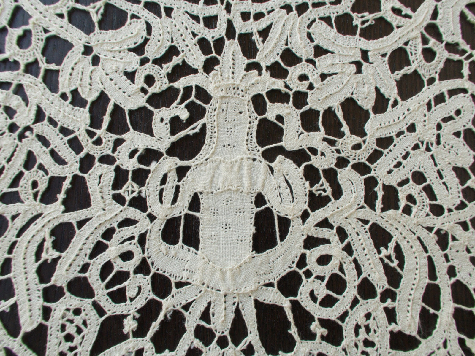 Vintage Italian bobbin lace runner featuring animals, birds and figures.