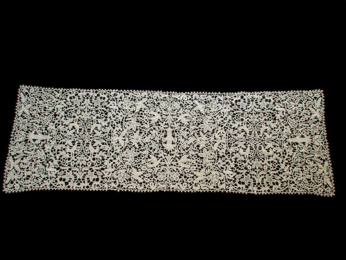 Vintage Italian bobbin lace runner featuring animals, birds and figures