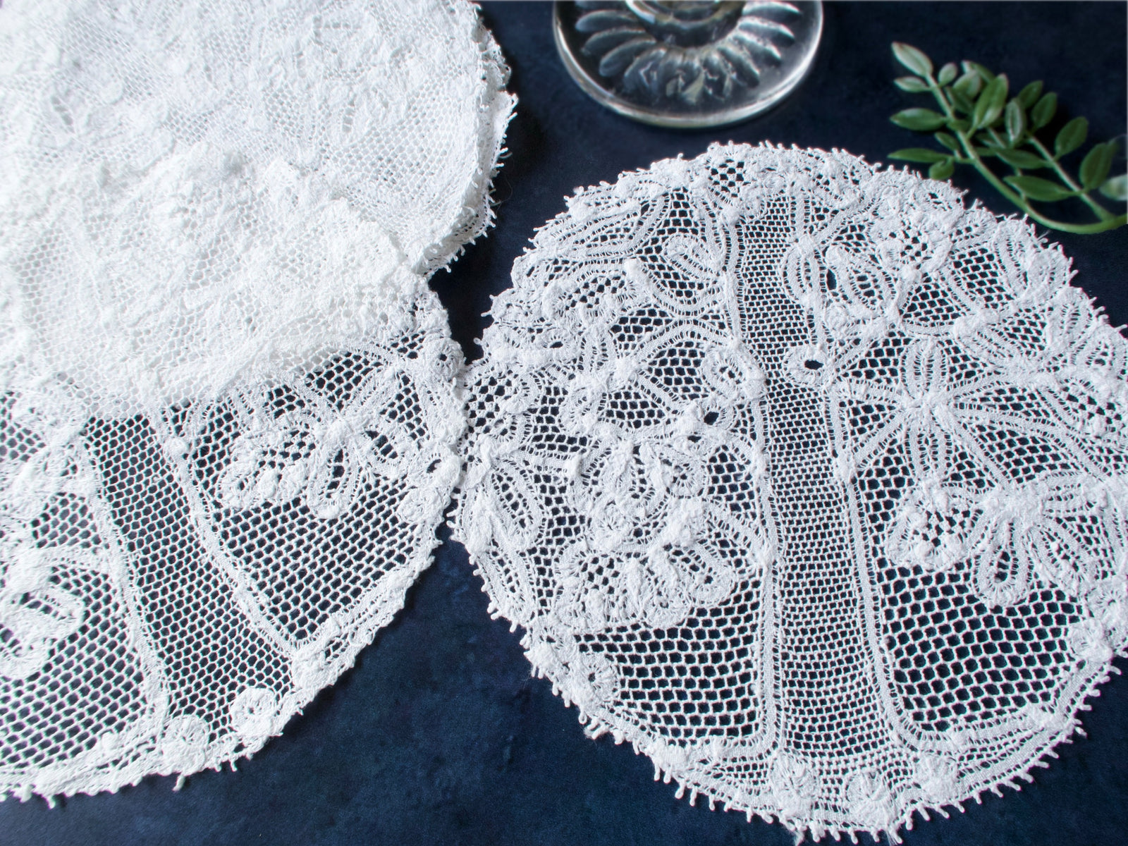 Set of eight vintage Renaissance lace cocktail rounds with stylized tree motif, intricate airy lacework.