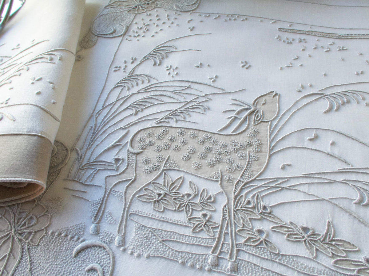 organdy placemat with hand embroidered deer figure