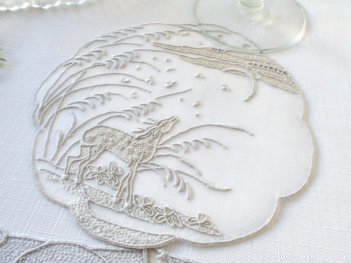 Vintage Marghab “Deer” pattern organdy coaster showing corner border detail with scrollwork and floral motifs.​​​​​​​​​​​​​​​​