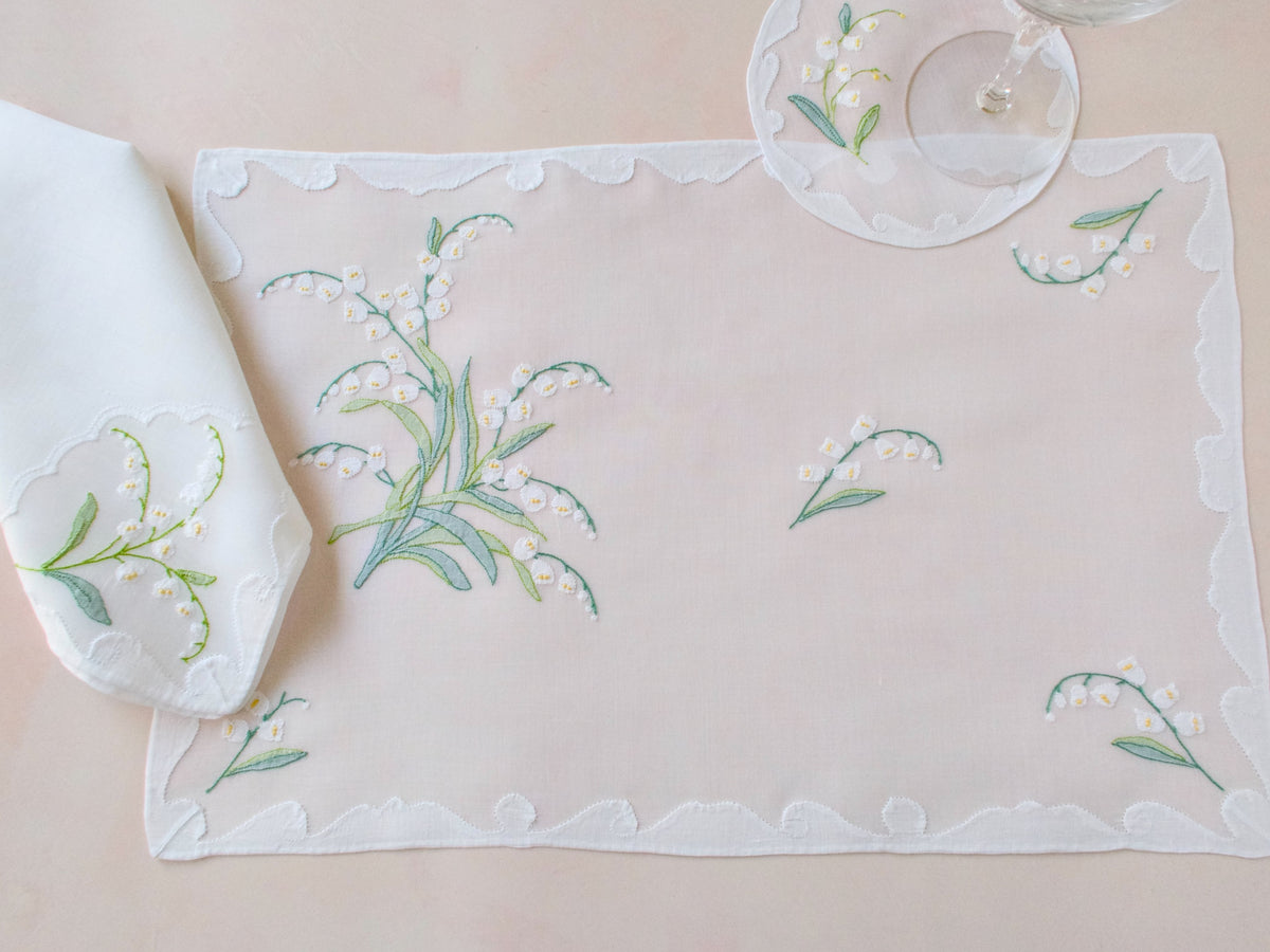 Lily of the Valley vintage Madeira placemat and napkin shown together, hand embroidered shadow work on organdy.