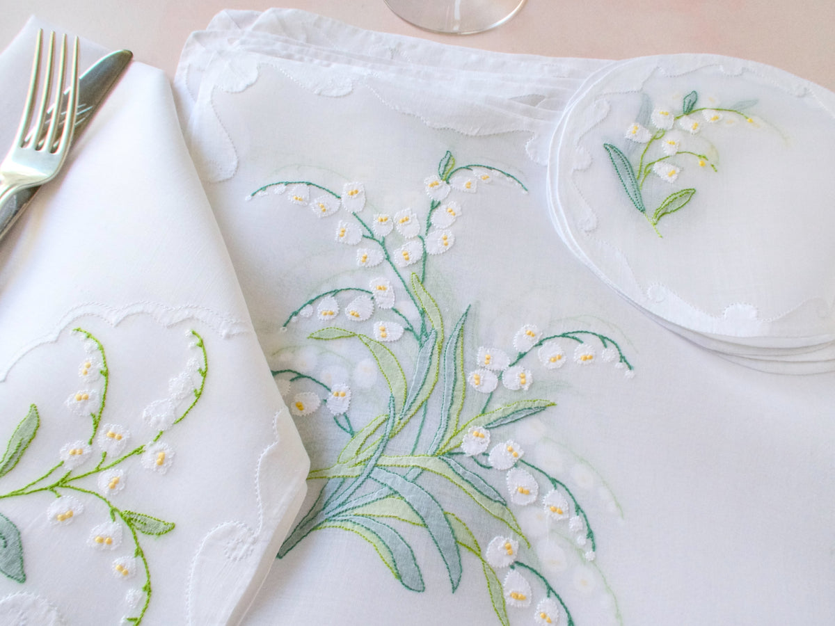 Vintage Madeira Lily of the Valley placemat set, sheer organdy with repliqué edges and fine green stem embroidery.