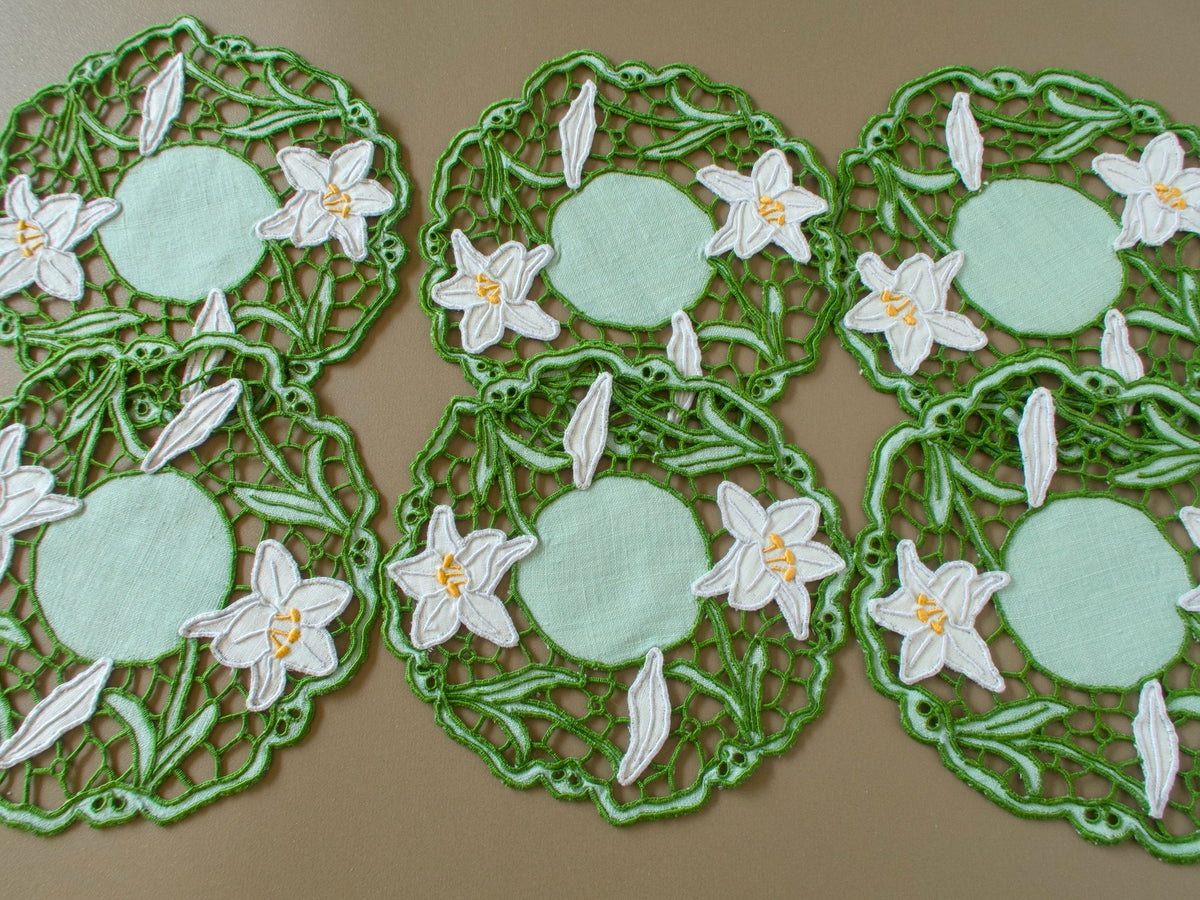Set of six vintage Madeira cocktail napkins with green Richelieu embroidery, pale green linen centers and white lilies.