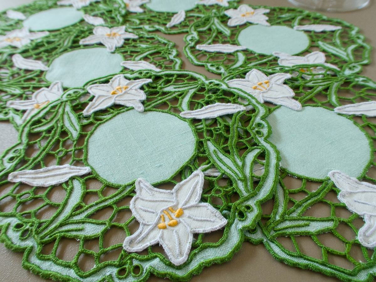Vintage Madeira cocktail napkins with green Richelieu embroidery, pale green linen centers and dimensional white lilies.