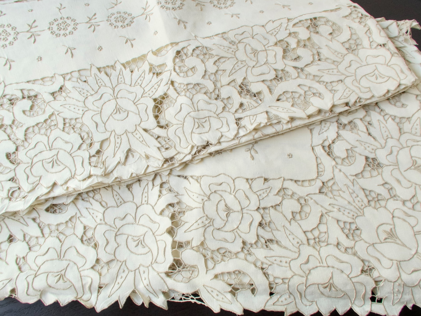 Accurate color tone of The Grand Madeira tablecloth, photographed in late-afternoon light to show true ivory hue.